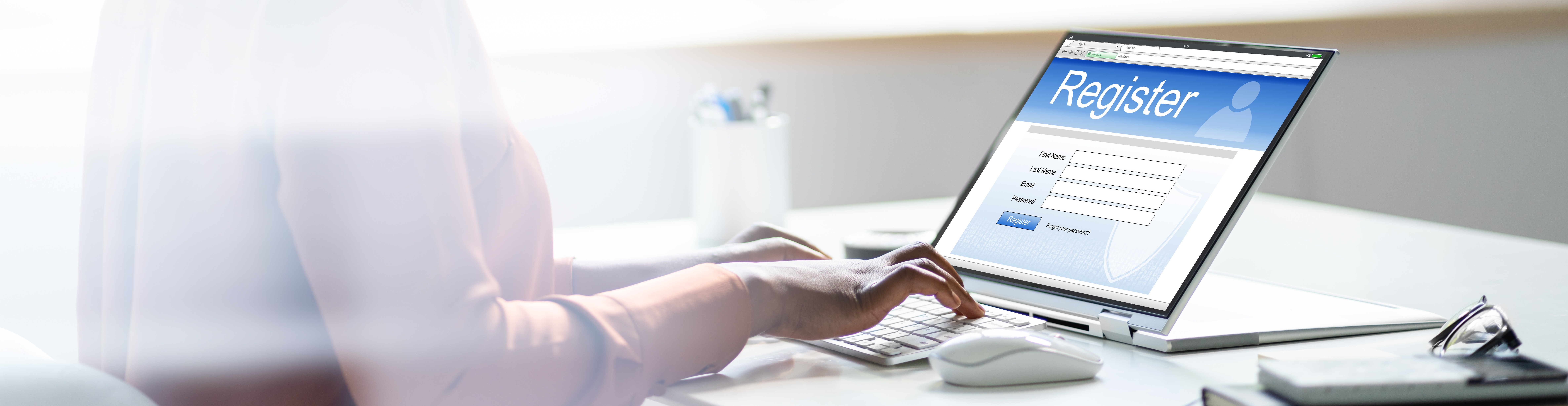 woman completing online registration form