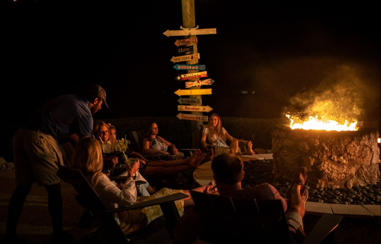 fire on the beach in the dark