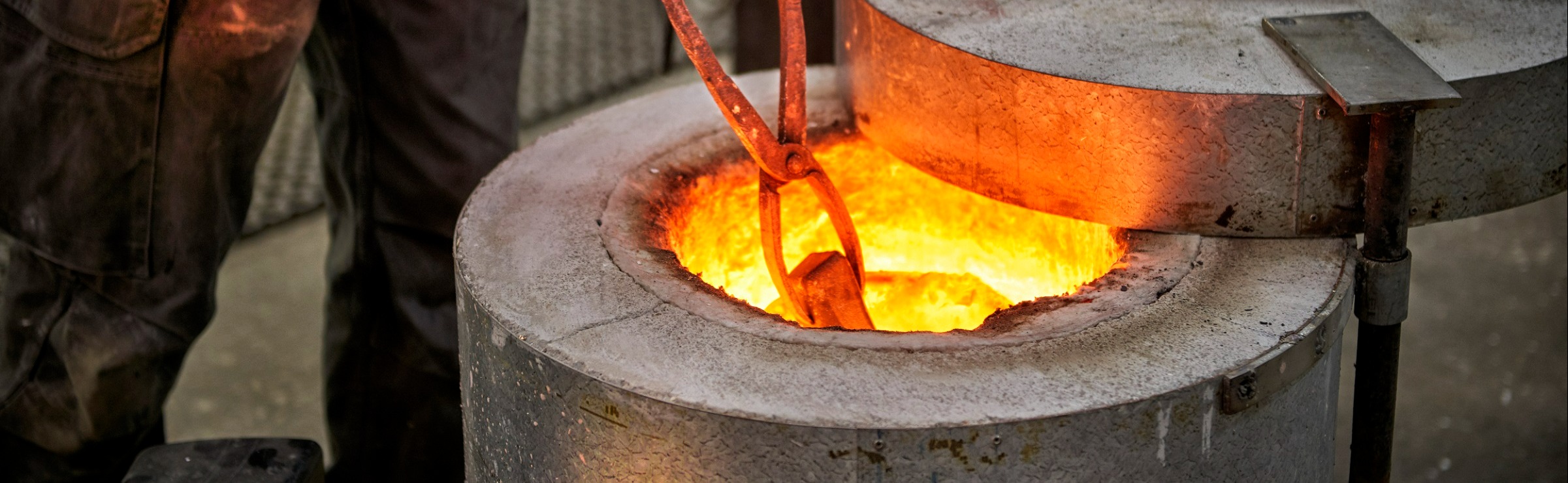 foundry furnace with glowing hot metal