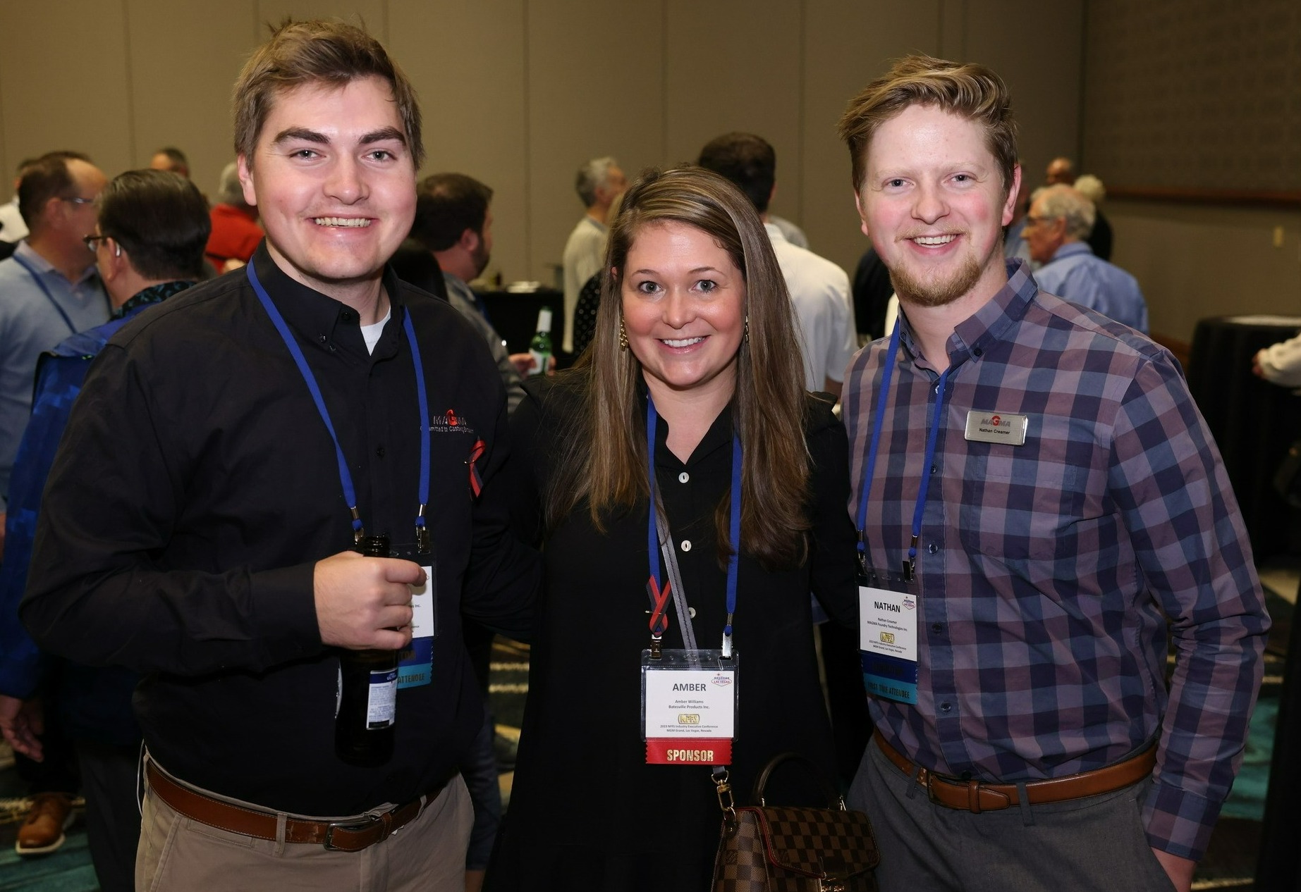 Three young professionals at a NFFS event