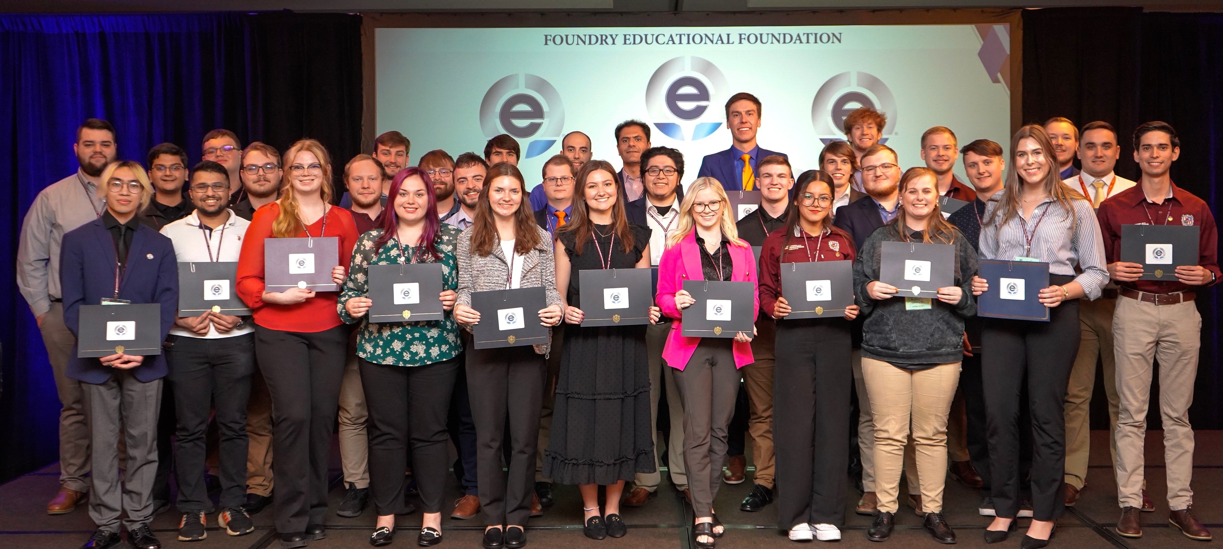 2023 FEF scholarship winners on stage holding awards