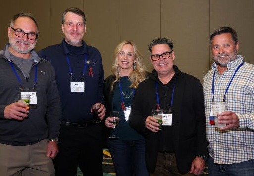 nffs welcome reception attendees smiling at camera