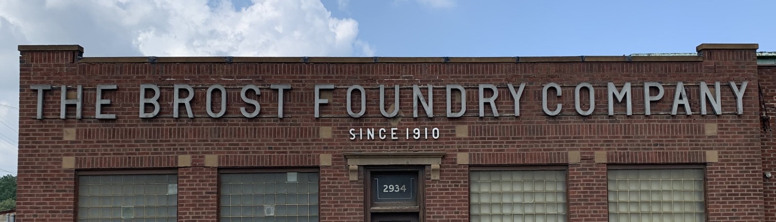 Lettering on Brost Foundry building spelling company name