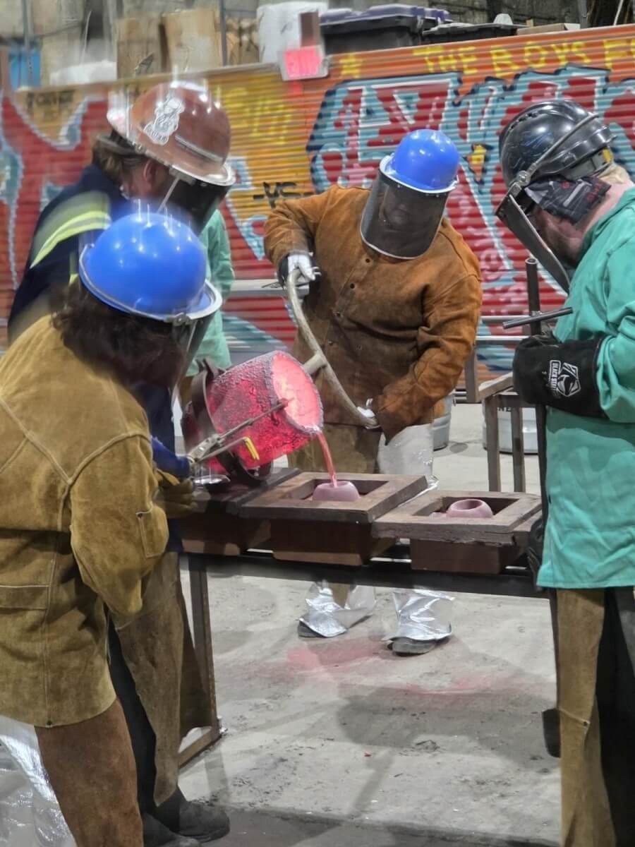 NFFS staff member wearing protective equipment during the casting workshop