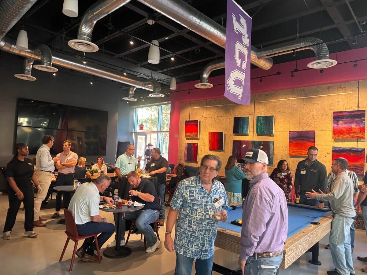 Attendees enjoying the Cast & Connect evening