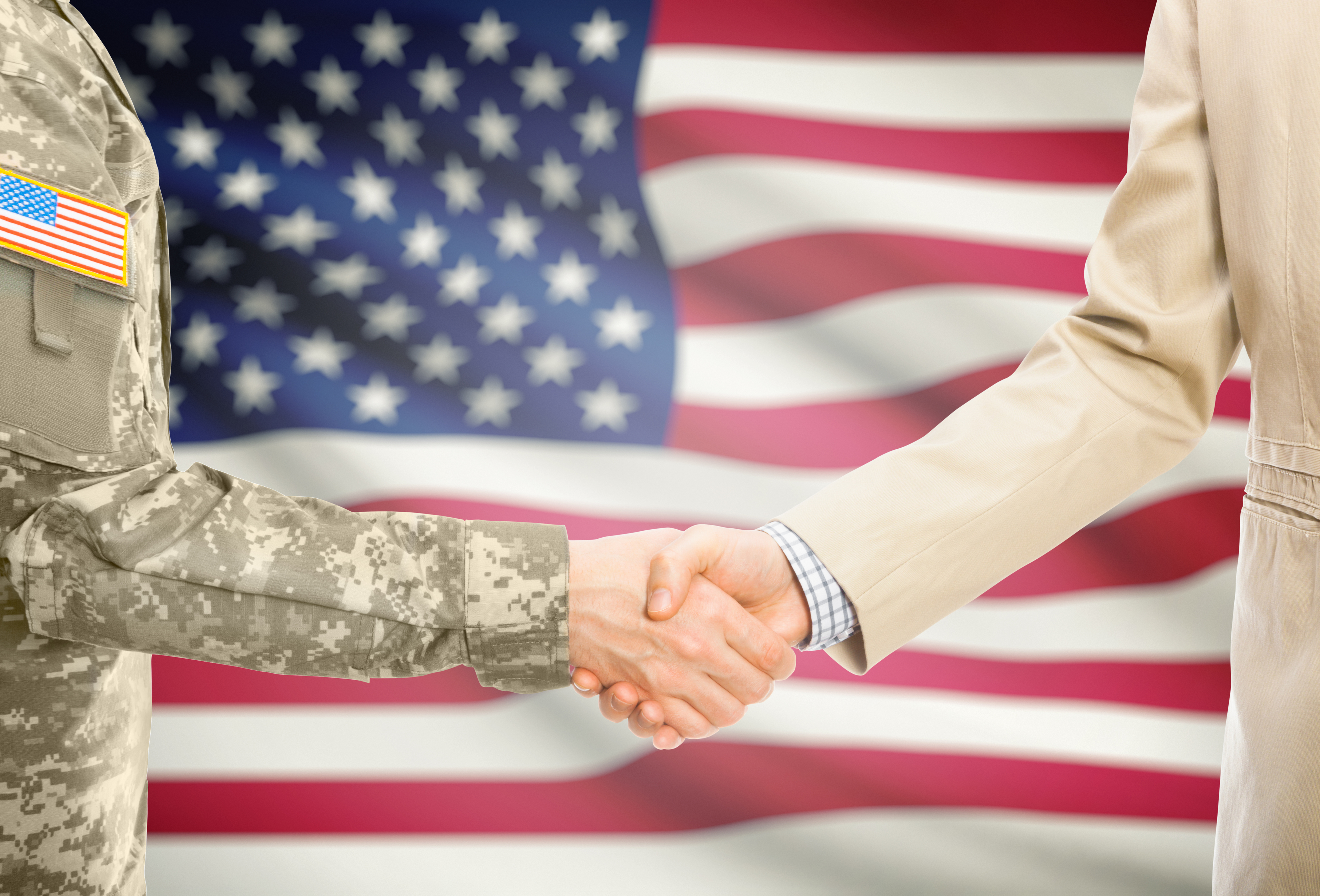 military and civilian handshake