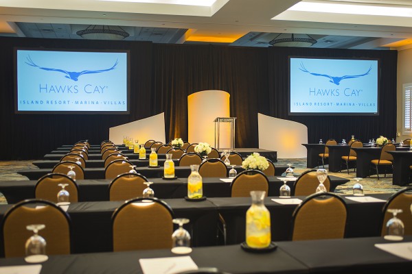 Ballroom at the Hawks Cay resort set up with presentation screens and seating