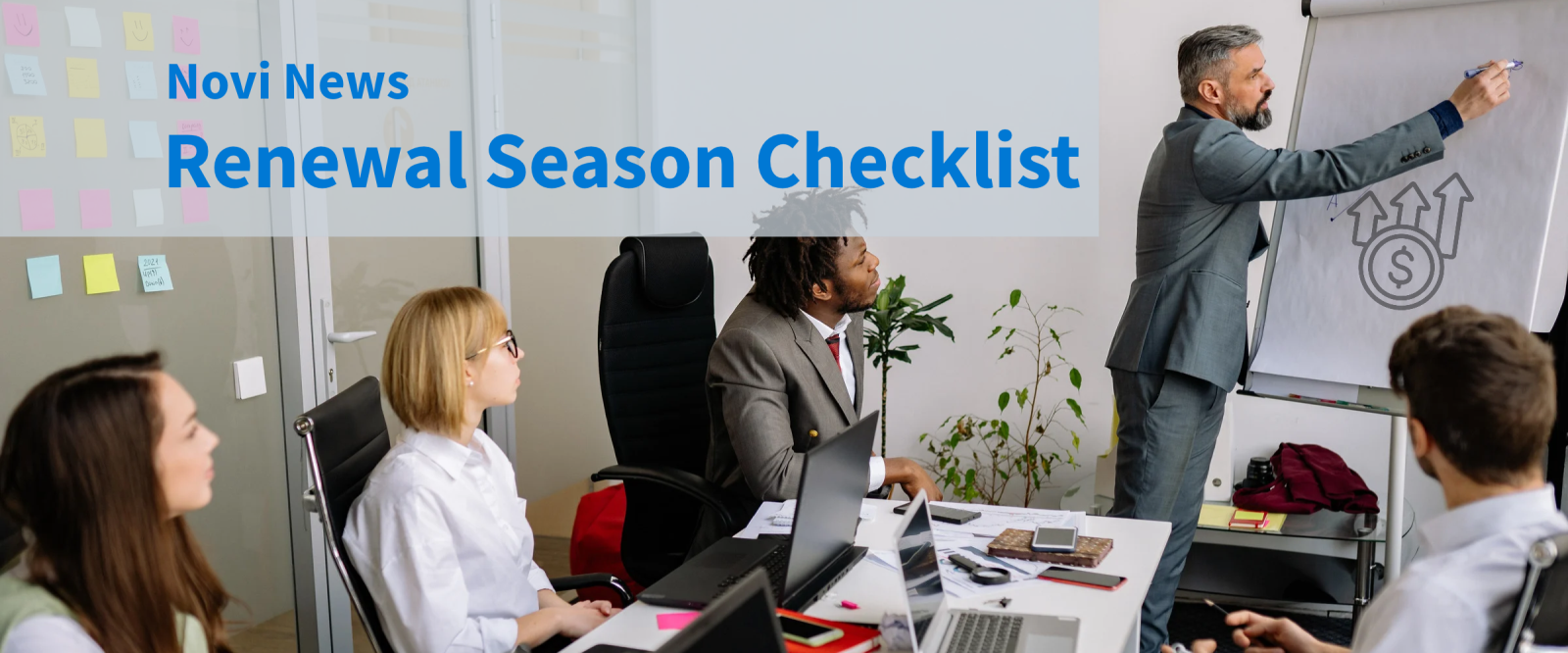 Association staff reviewing a renewal season checklist together at a conference table