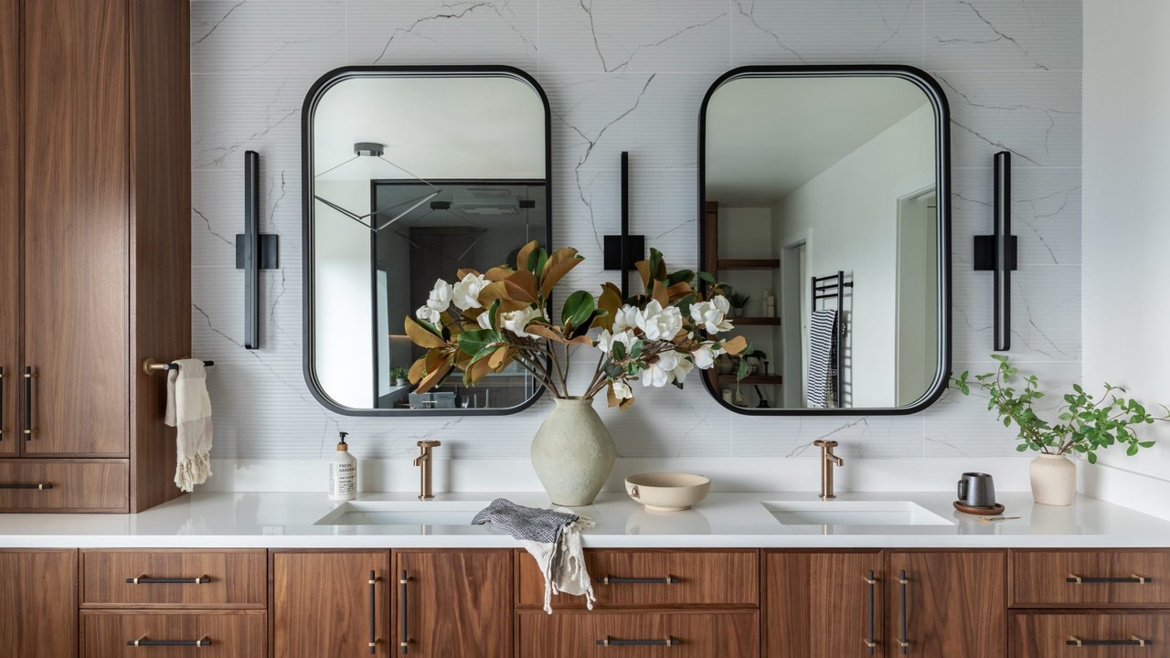 Bathroom remodel in Issaquah, WA with walnut double vanity by Higgason Homes