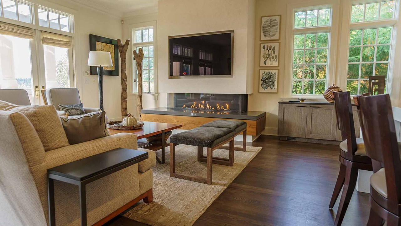 Home remodel on Mercer Island, WA with modern linear fireplace by Higgason Homes