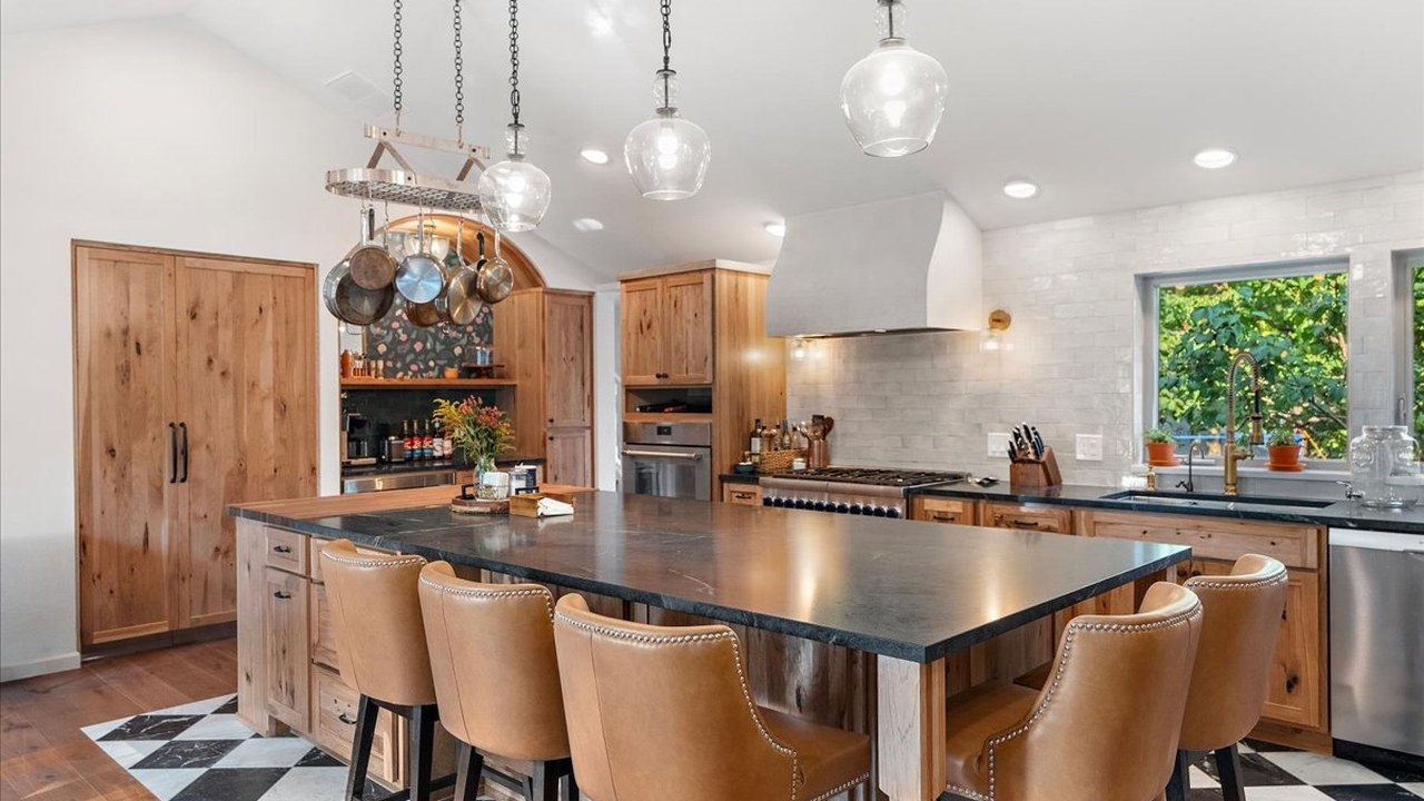 Kitchen remodel in Sammamish, WA with soapstone island and hickory cabinets by Higgason Homes