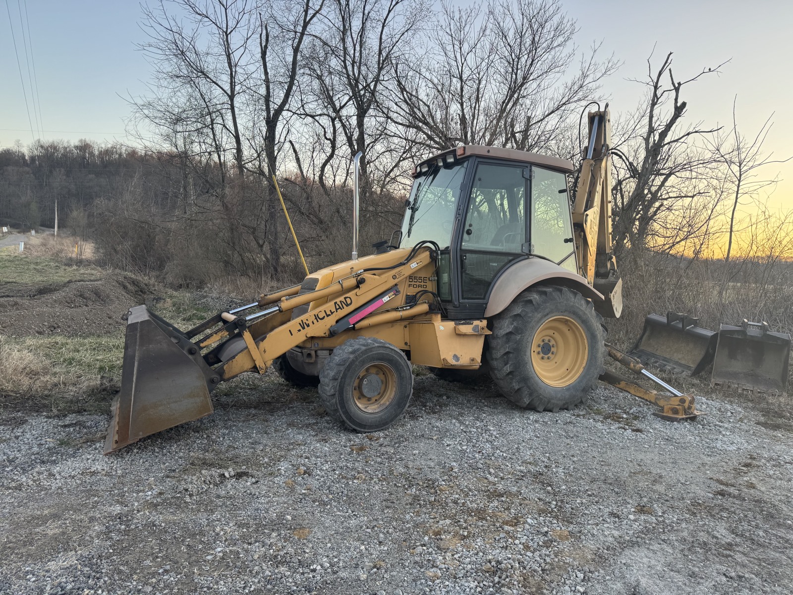 Photo of 1998 555E New Holland Backhoe