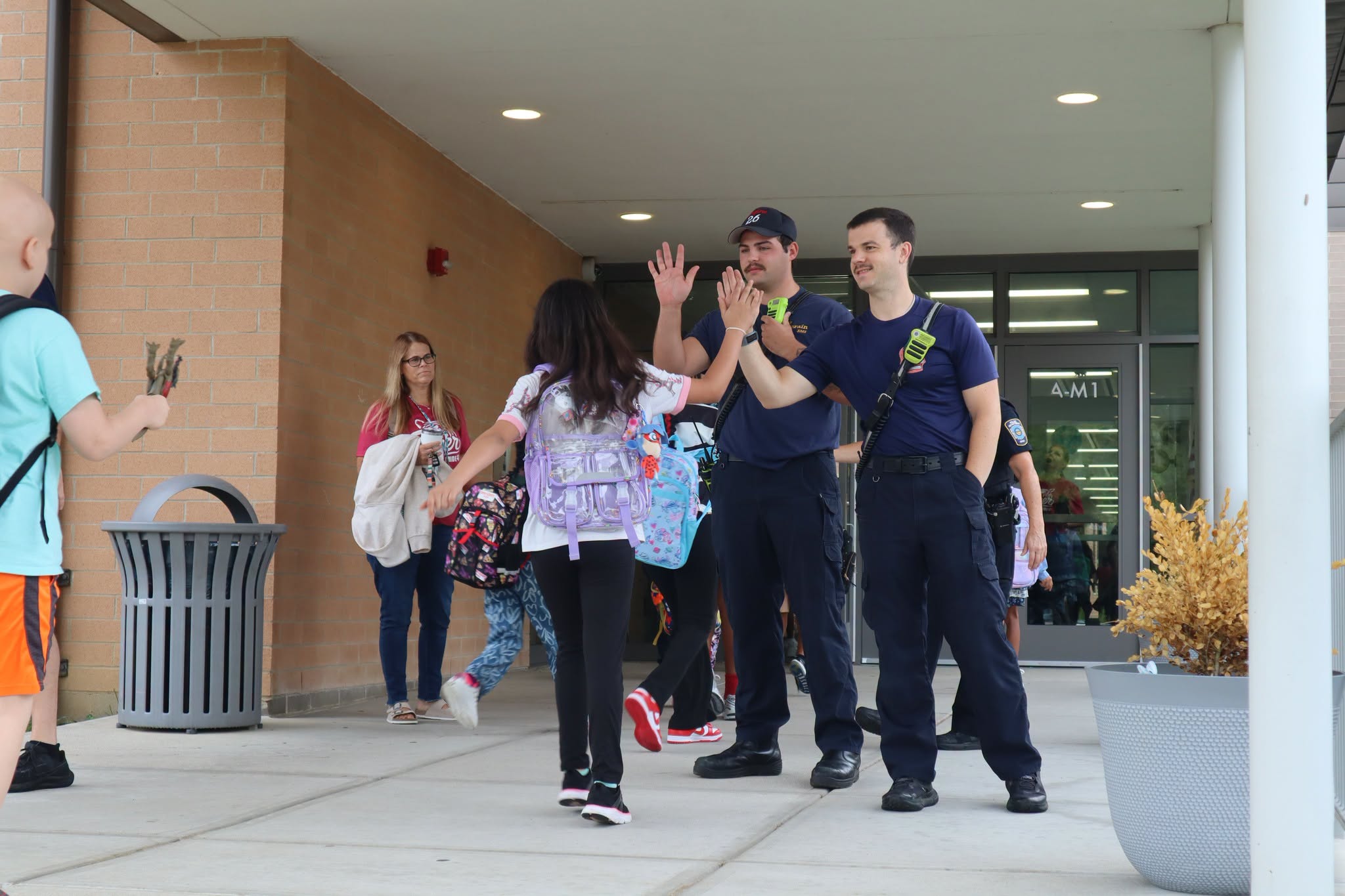 First responders greeting Colerain Township students on the first day of school