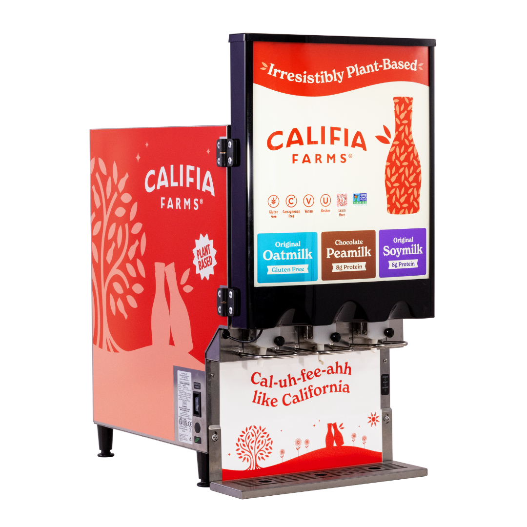 Califia Farms plant-based beverage dispenser featuring options like oatmilk, peamilk, and soymilk. Decorated in red and white with nature motifs.
