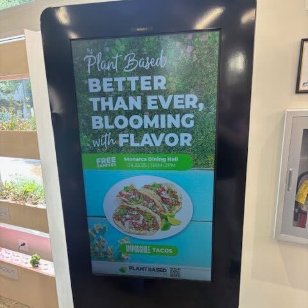 Digital display advertising plant-based tacos with a foliage background and a blue section showing two tacos on a plate.