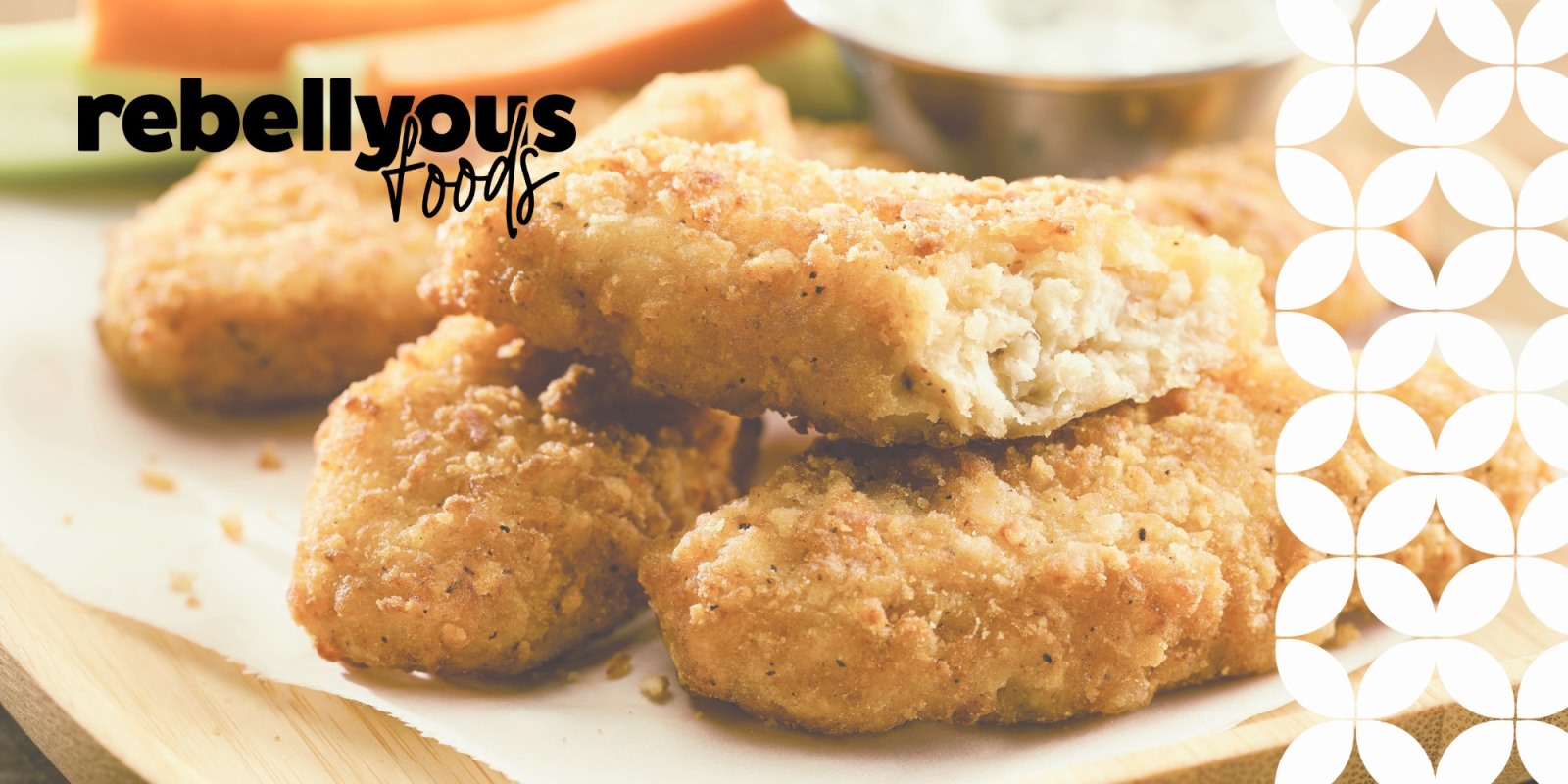 A close-up of crispy, golden-brown plant-based nuggets stacked on a wooden plate, with one nugget broken in half to show its textured interior. The "rebellyous foods" black text logo sits in the upper-left corner, and a white geometric pattern frames the right border.