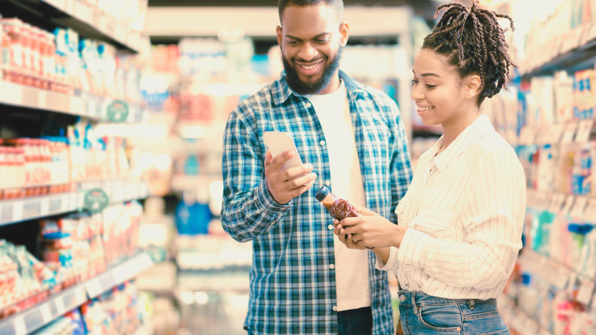 Repeat plant-based shoppers look at their choices in the grocery aisle