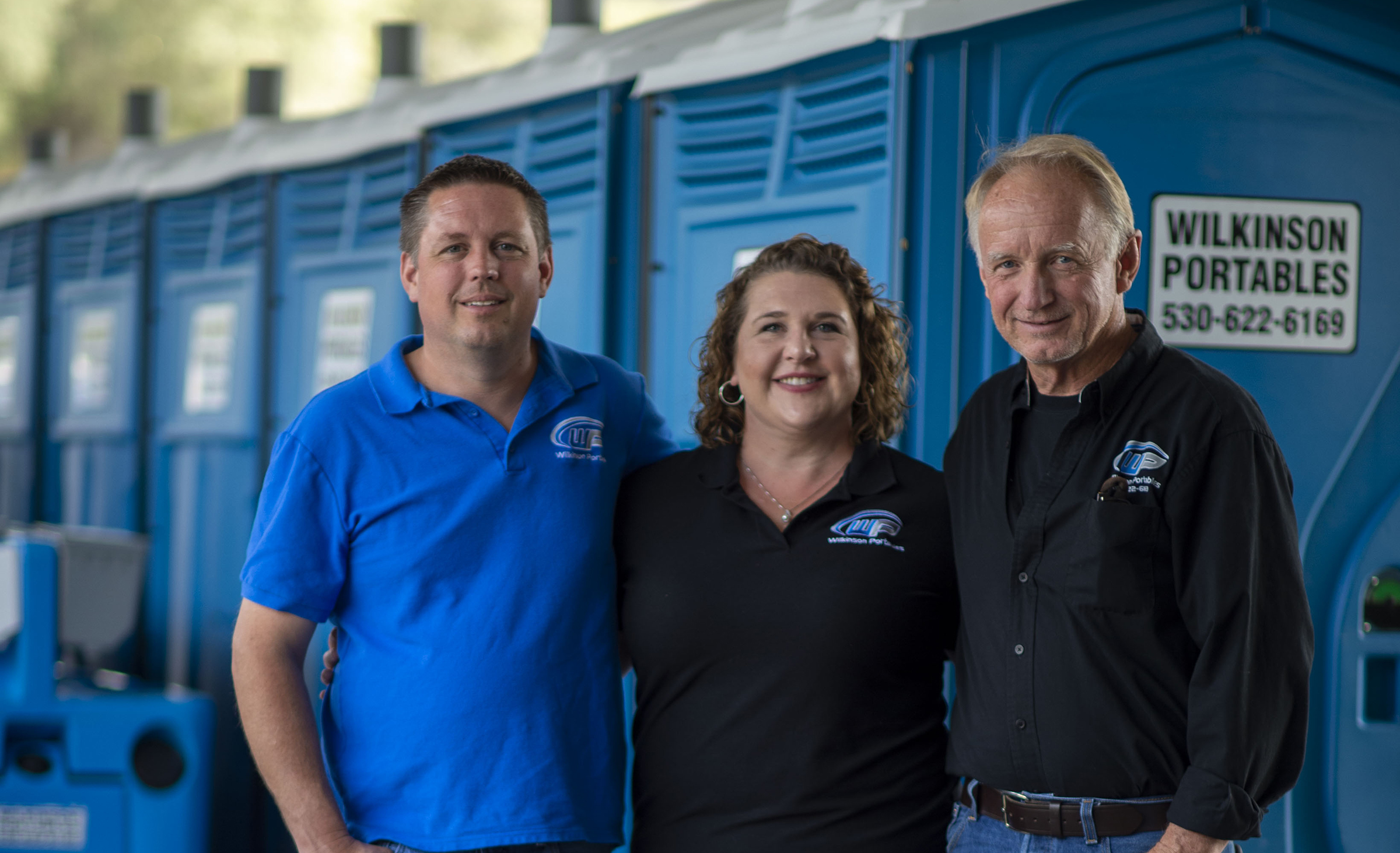 Kym with her husband and father in law