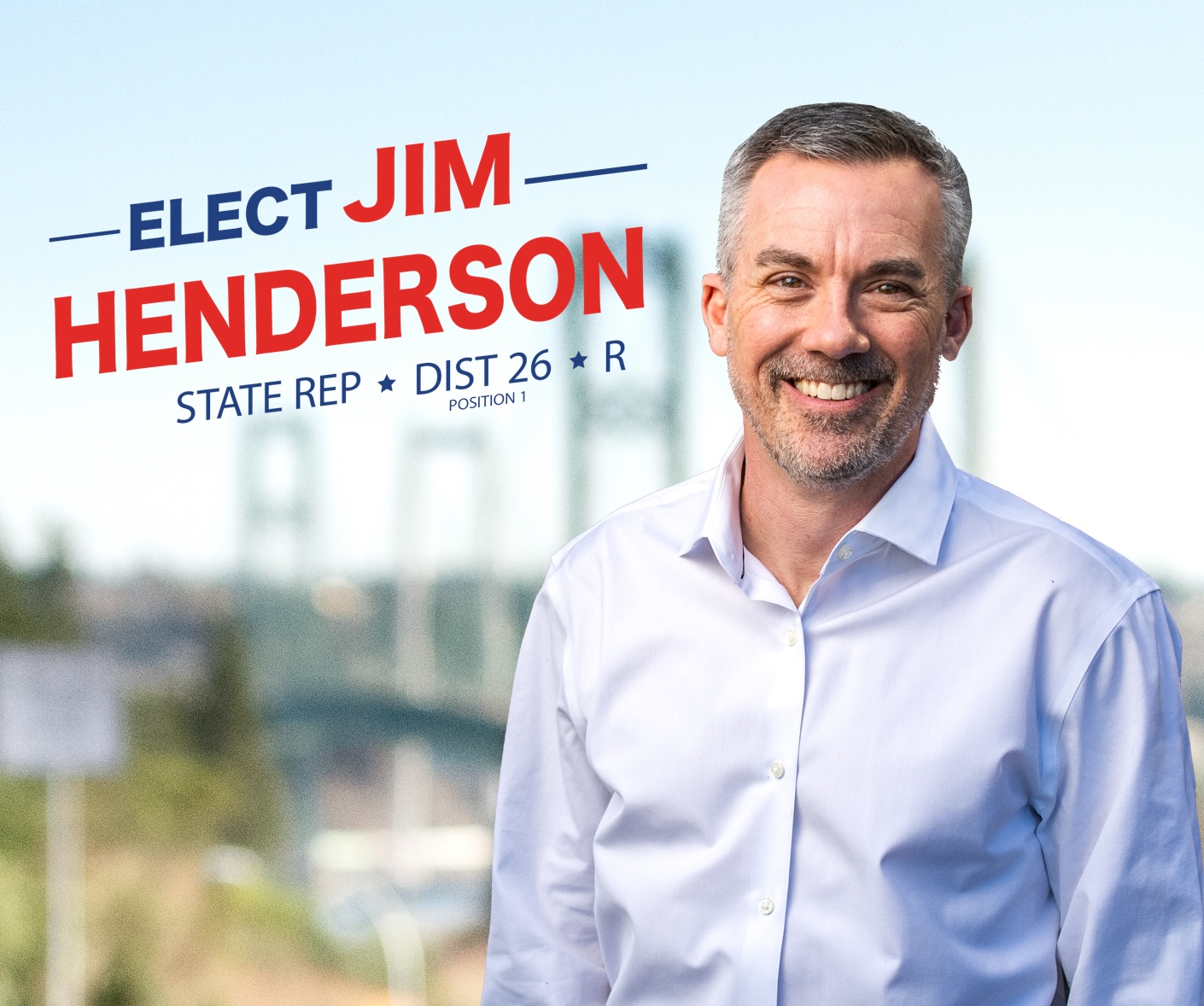 A man stands in front of a sign that says elect jim henderson