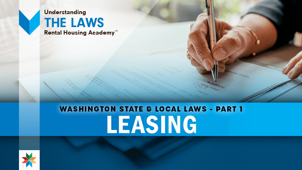 A group of people looking at a paperDescription automatically generated