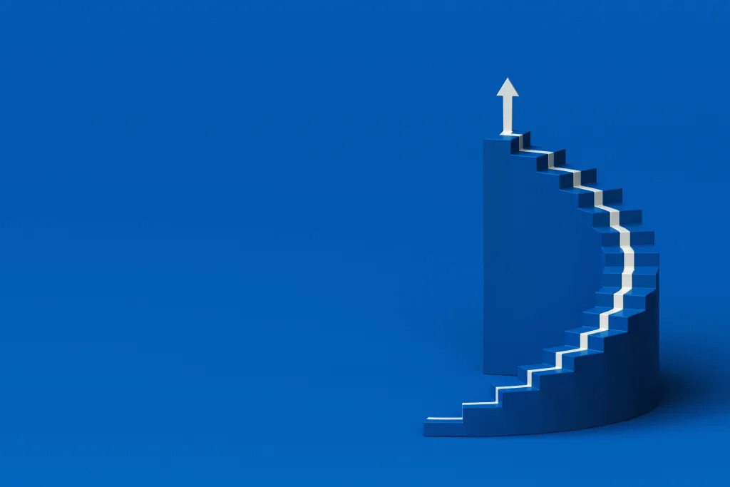 A stock arrow going up a flight of stairs