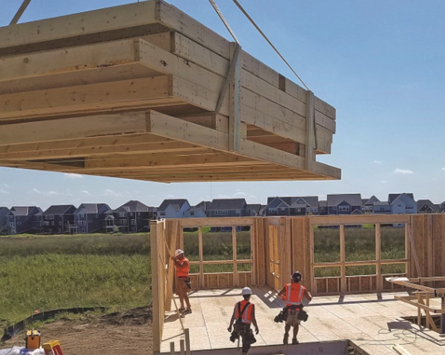 Construction jobsite installing wall panels