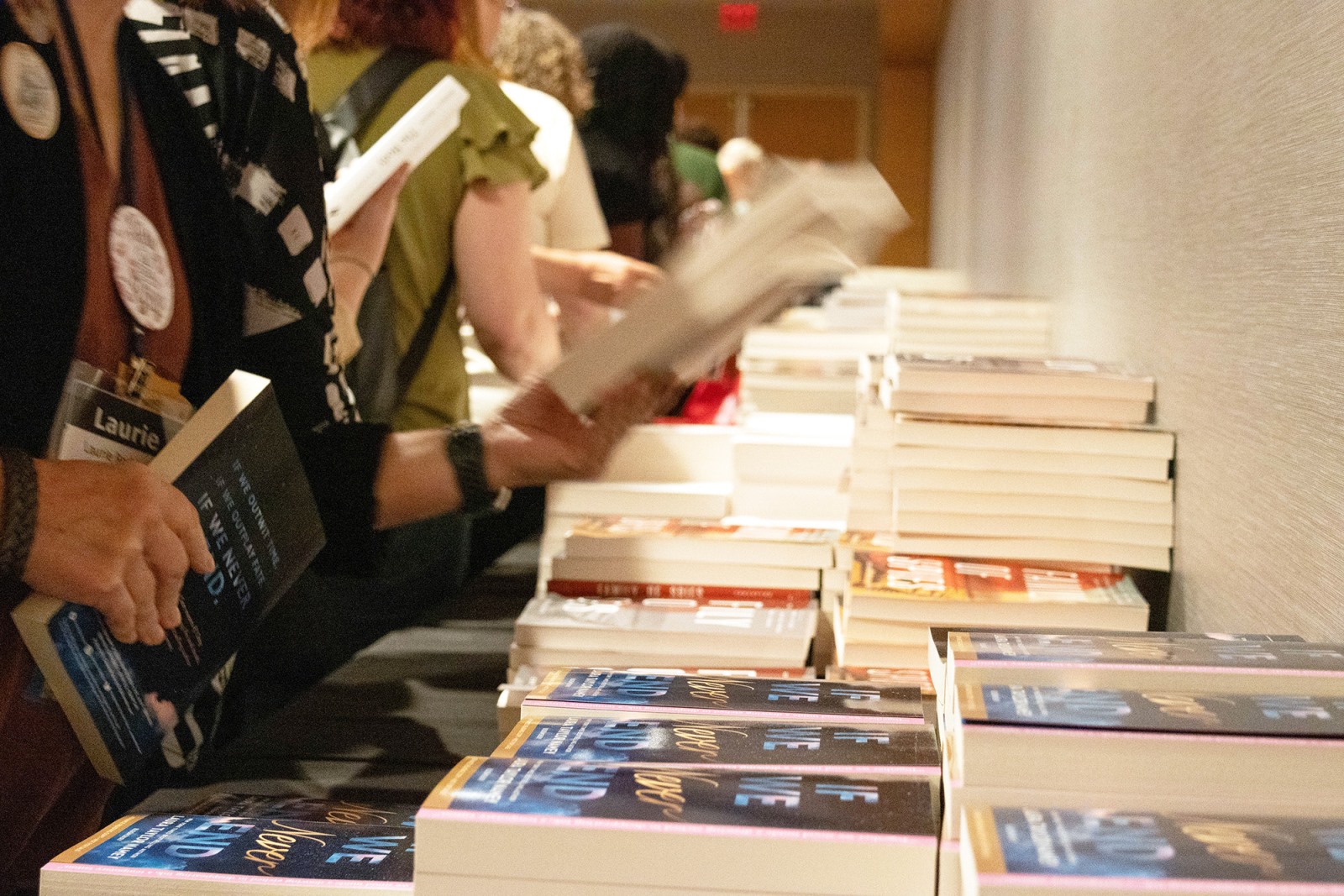 People looking at a display of books during NVNR 2025