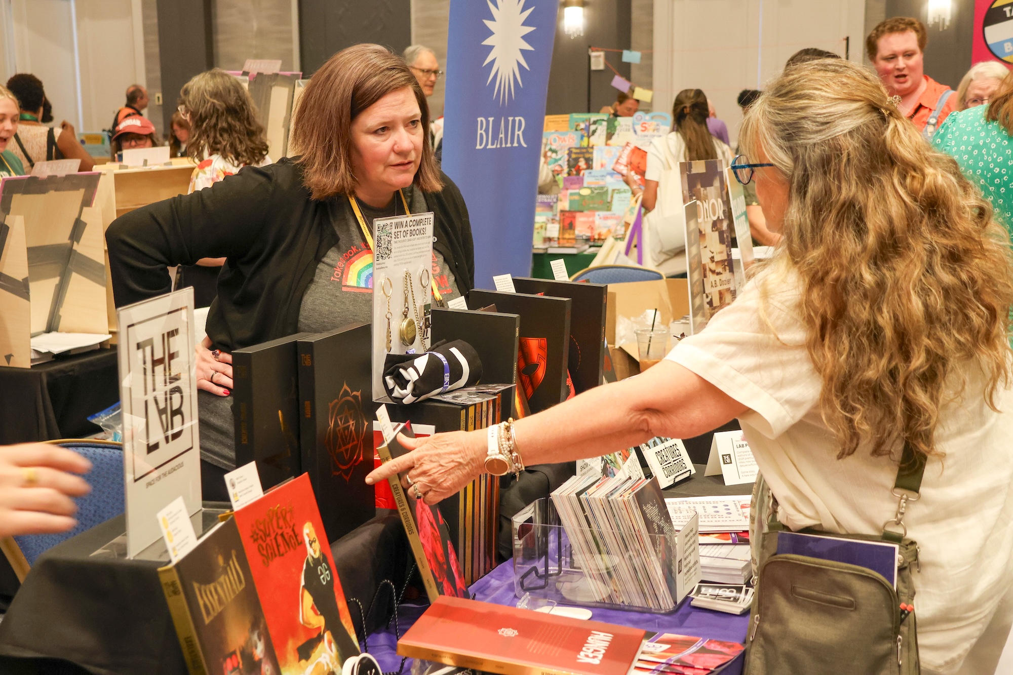 Publisher rep from BLAIR on the exhibit floor at the SIBA annual conference and tradeshow