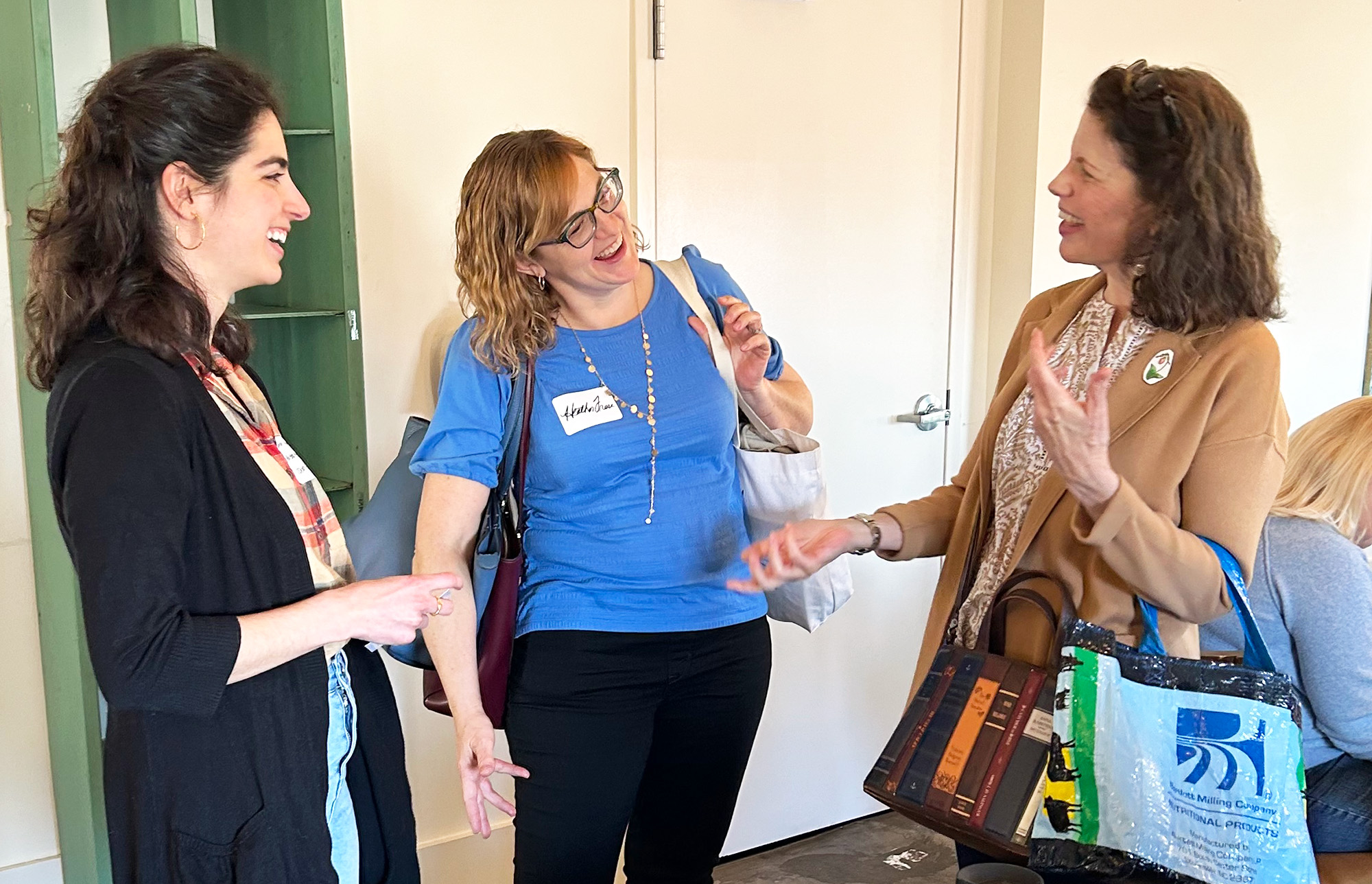 Booksellers at M Judson in Greenville SC during a 2024 March Madness bookstore event