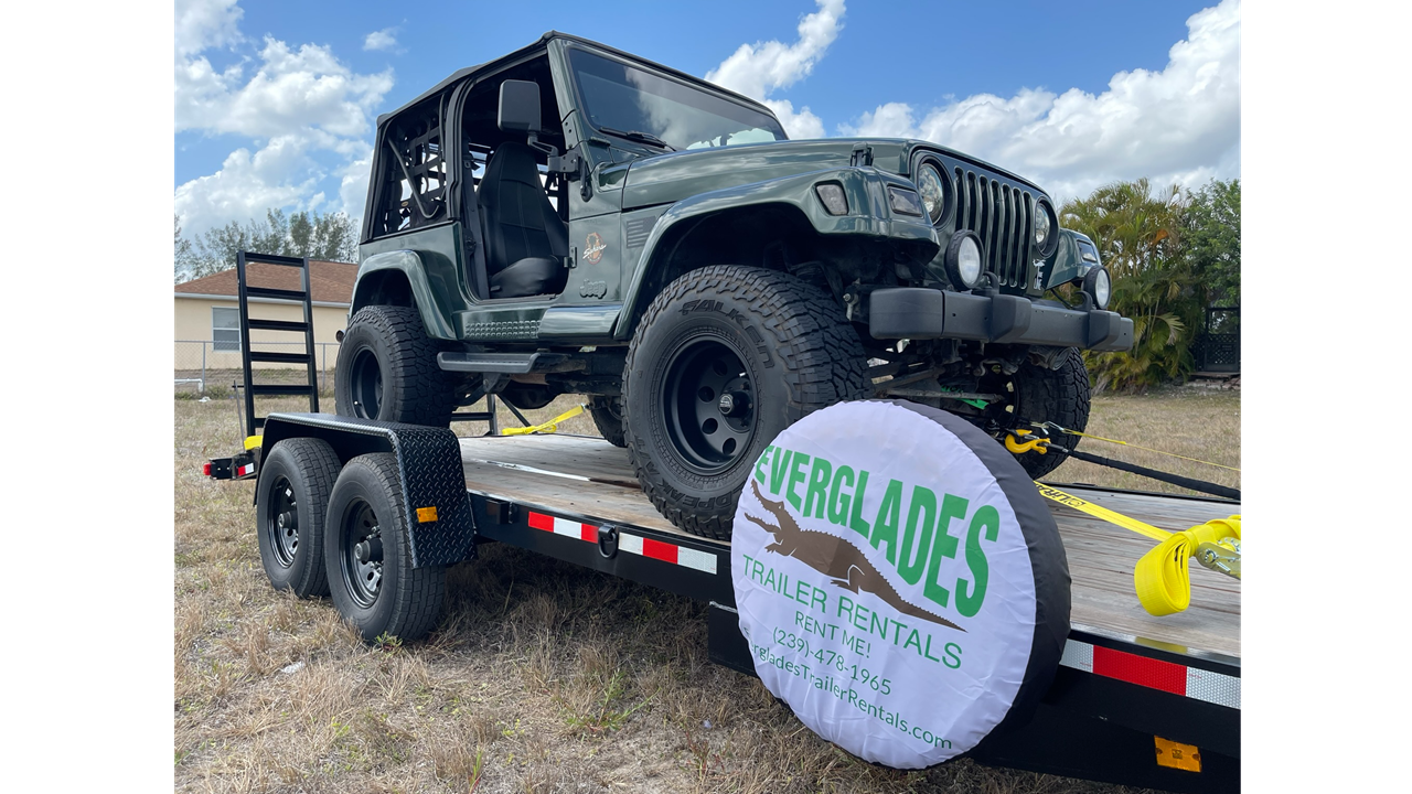 7x20 14K with a 1998 TJ Jeep Wrangler loaded on it