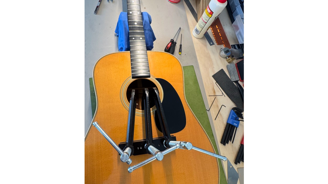 Repairing broken acoustic guitar bridge