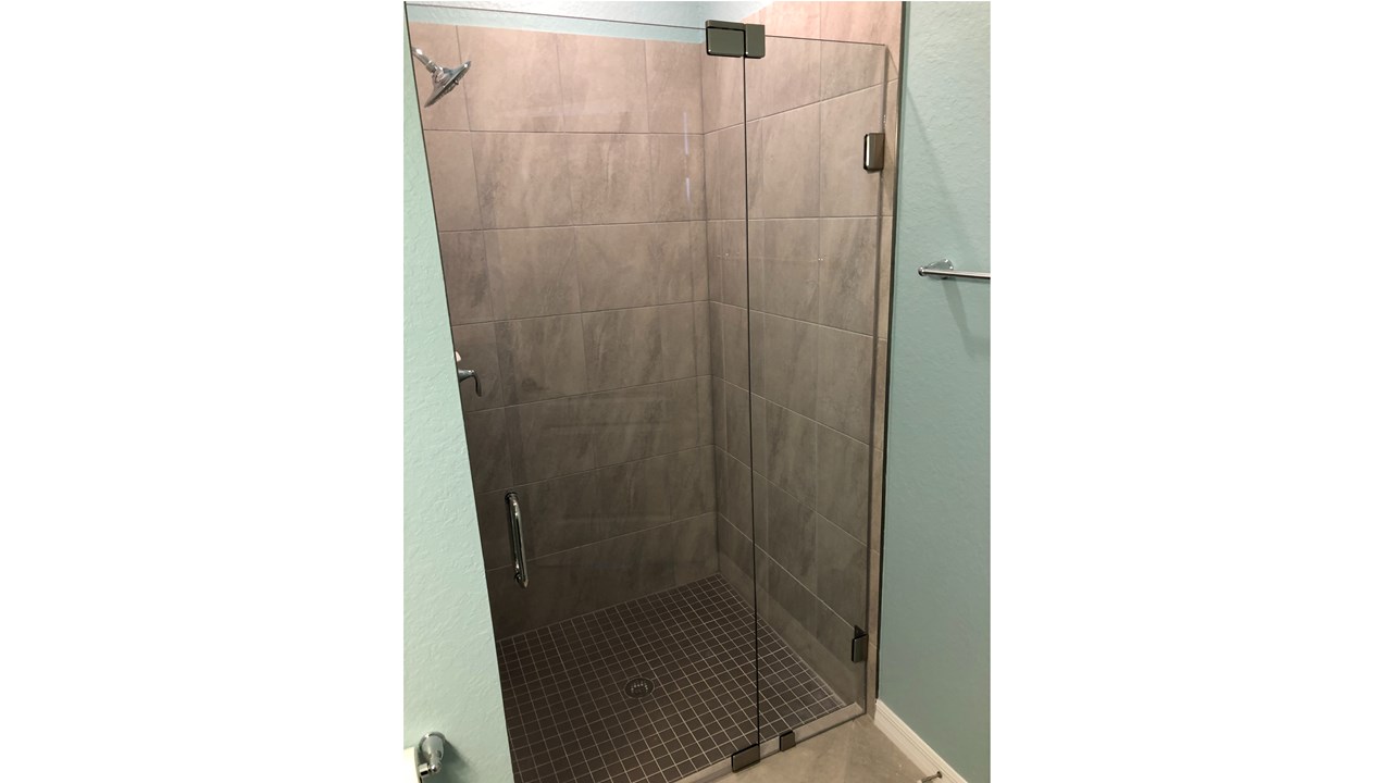 Simple Frameless Shower Door & Panel