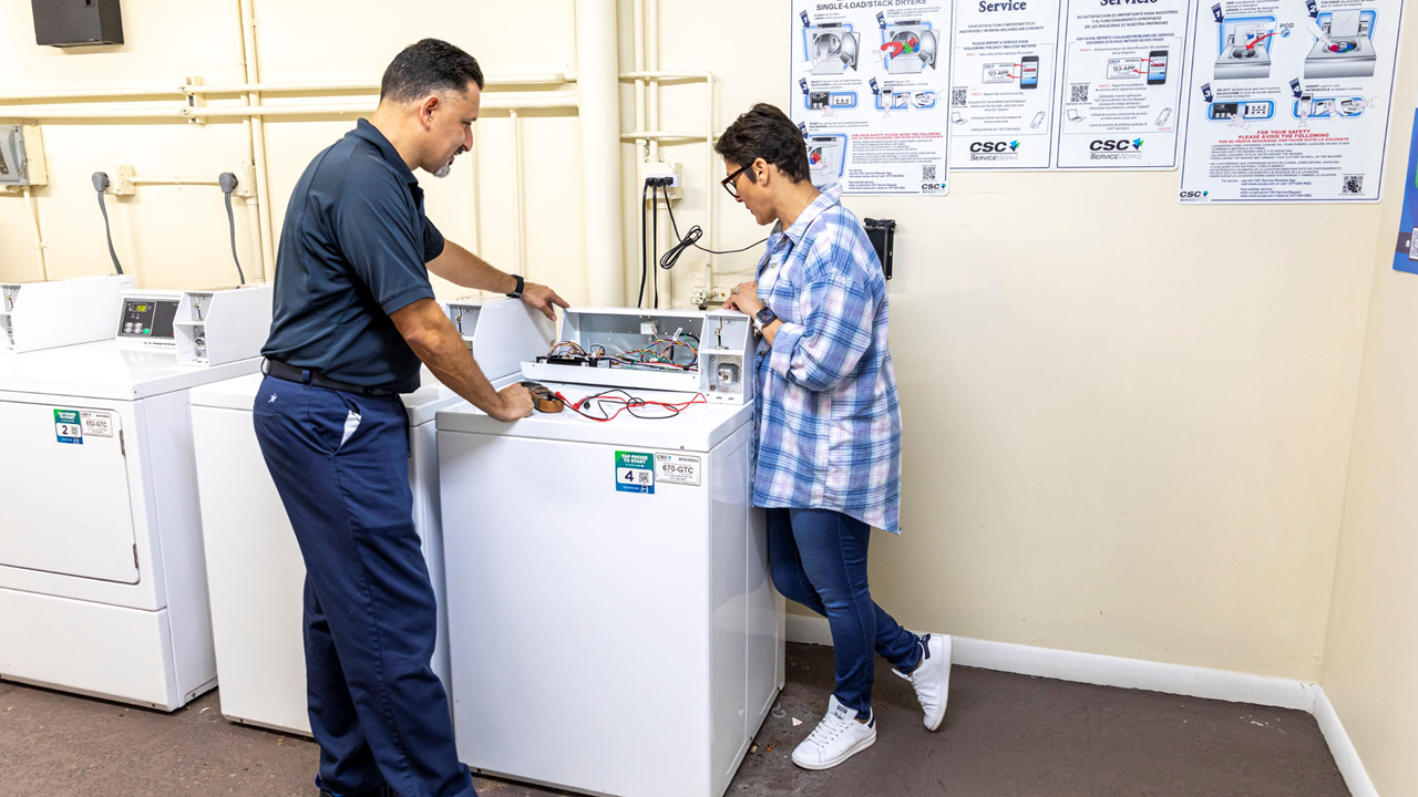 Service Tech Assisting Property Manager