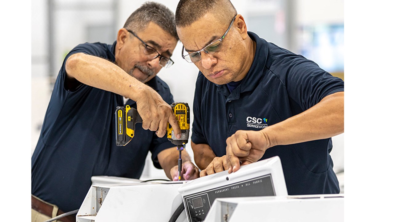 Service Tech Repairing a Machine 