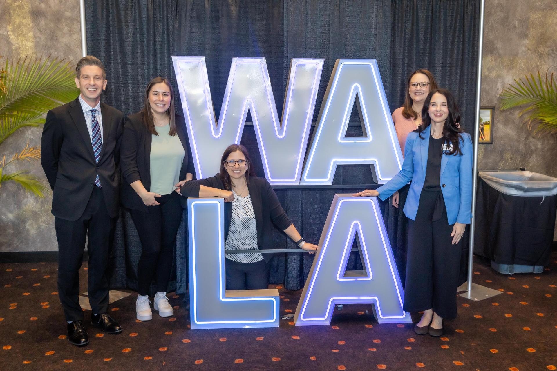 Attendees connecting at a WALA event
