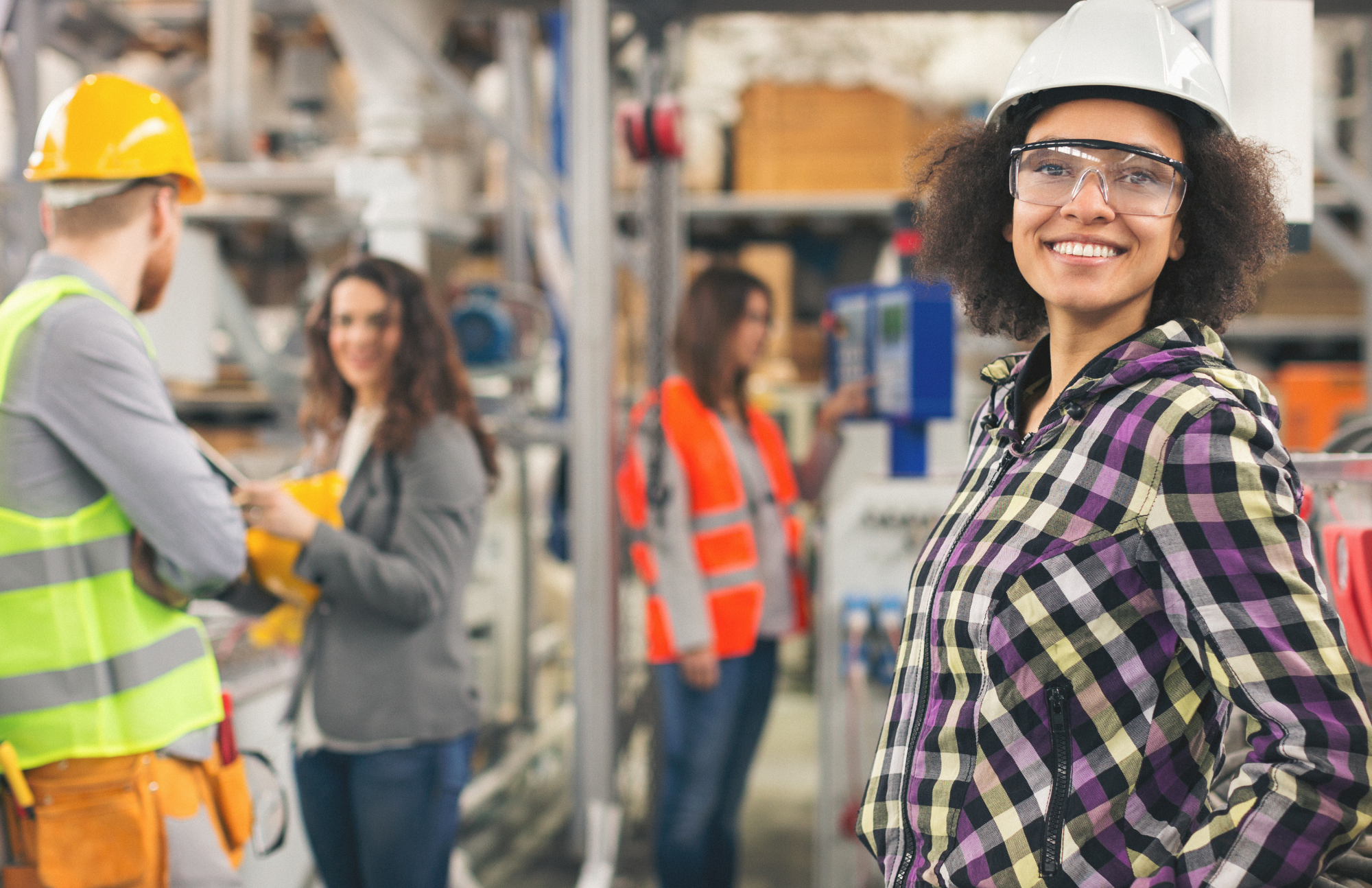 woman hadhat manufacturing floor