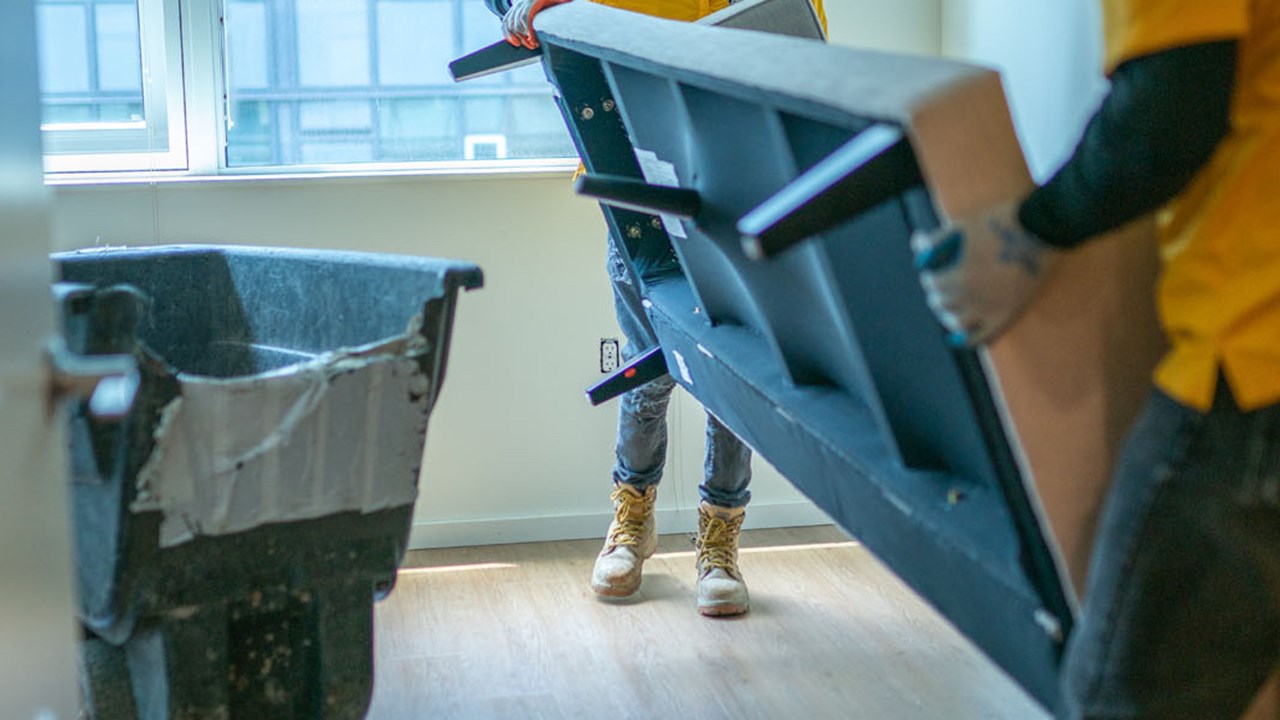 Junk B Gone Employees Removing Furniture Tenants Left Behind