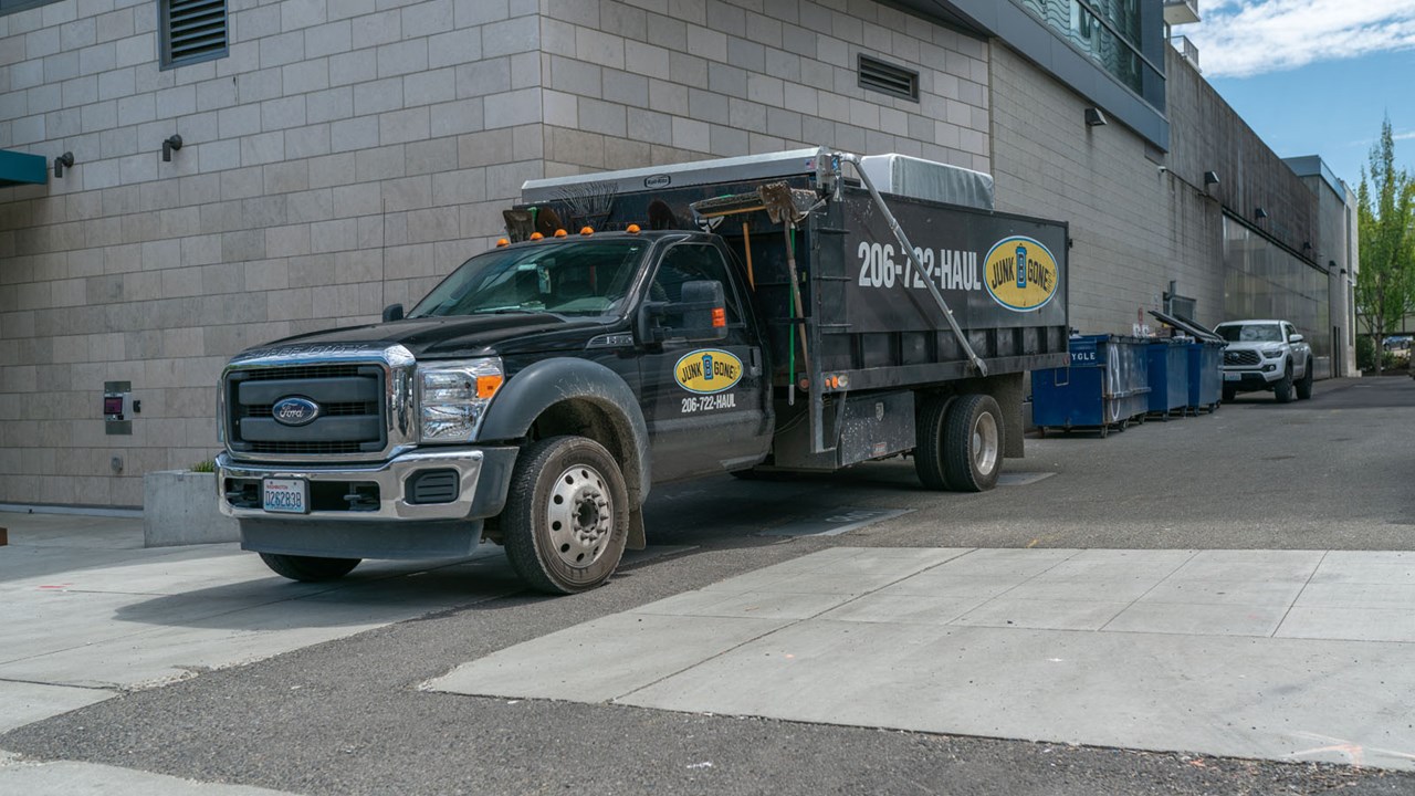 Junk B Gone Truck Parked Outside Danforth Apartments